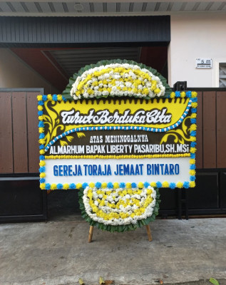 Papan Bunga Duka di Condong